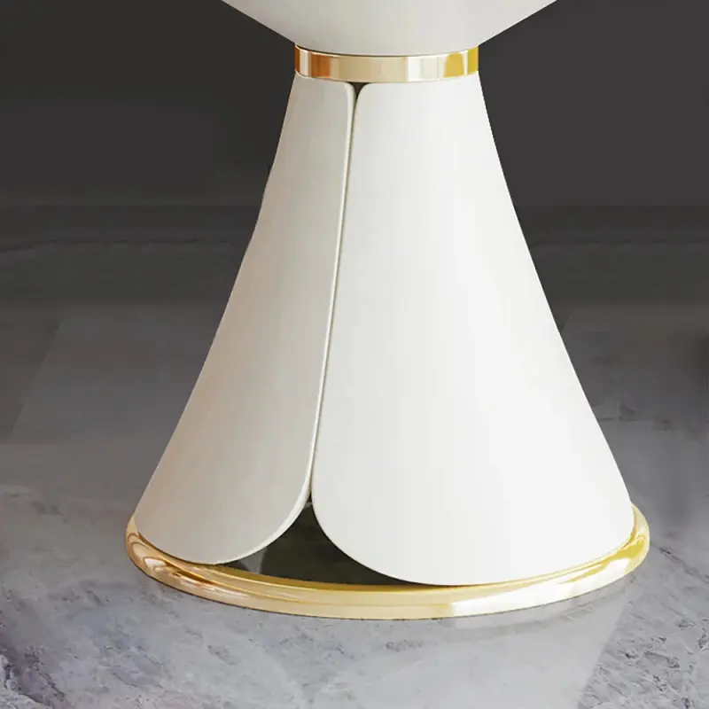 طاولة طعام دائرية بسطح من الرخام وقاعدة ذهبية