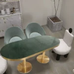 طاولة طعام بيضاويه من الرخام الأخضر